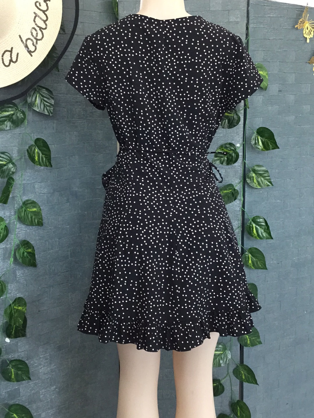 Black Polka Dot Mini Dress with wrap around front fastening & frill at bottom - Size XS
